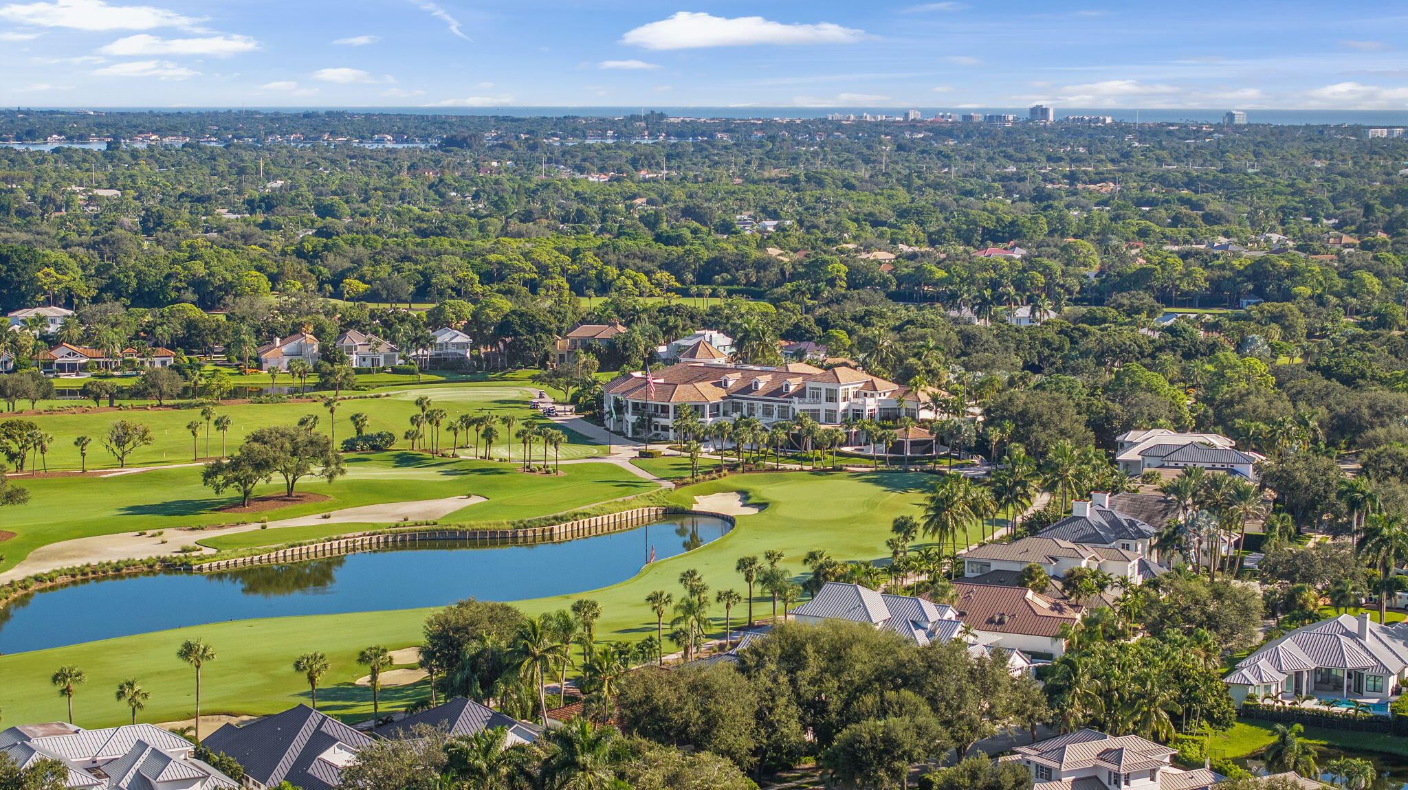 208 Locha Drive Jupiter, FL 33458 - Photo 122 of 125 an aerial view of a residential houses with outdoor space and river view