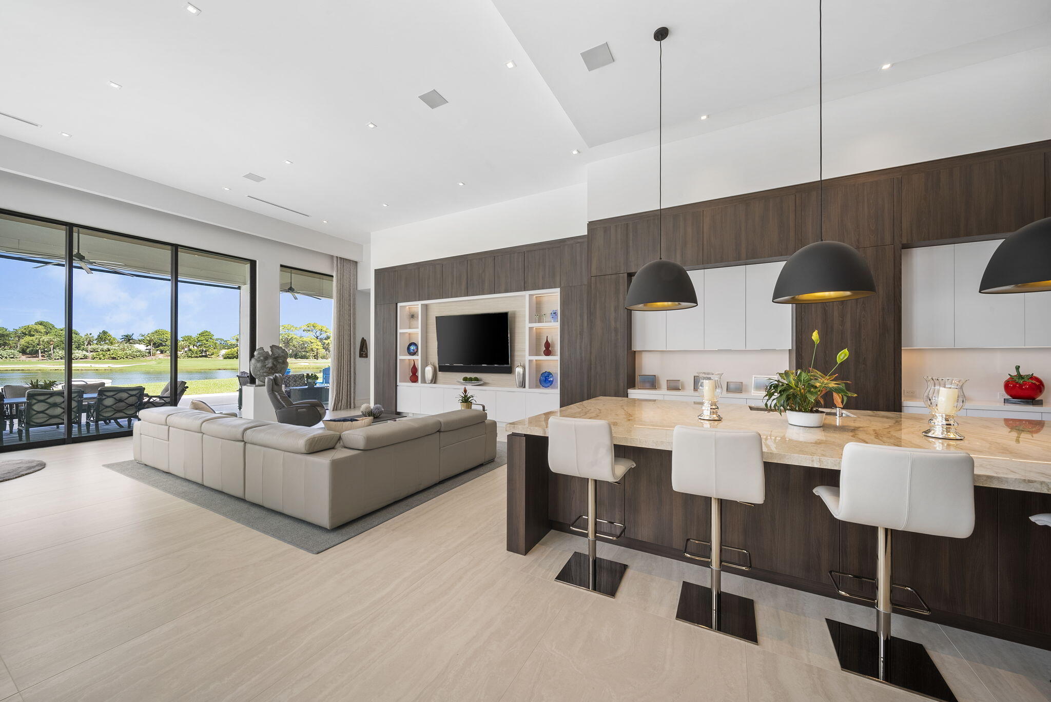 208 Locha Drive Jupiter, FL 33458 - Photo 17 of 125 a living room with furniture and a large window