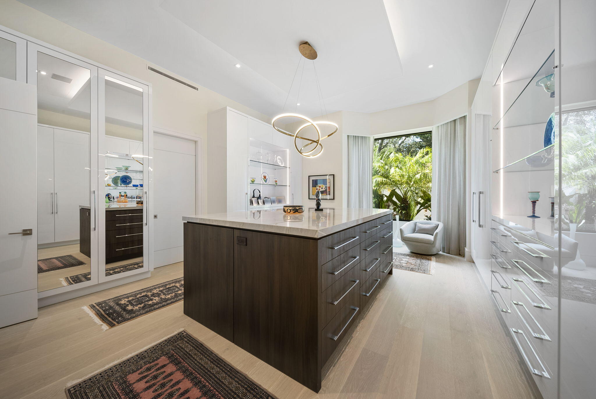 208 Locha Drive Jupiter, FL 33458 - Photo 39 of 125 a spacious bathroom with a double vanity sink a mirror and a bathtub