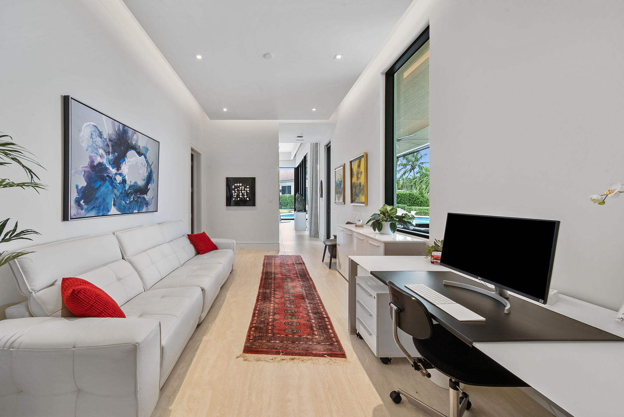 208 Locha Drive Jupiter, FL 33458 - Photo 44 of 125 a living room with furniture and a flat screen tv