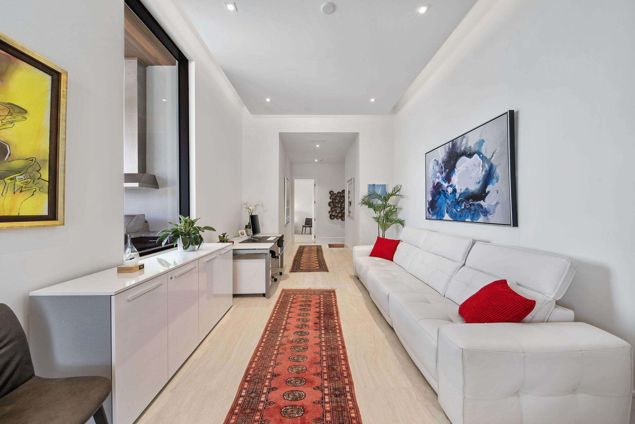 208 Locha Drive Jupiter, FL 33458 - Photo 45 of 125 a living room with a rug and white walls