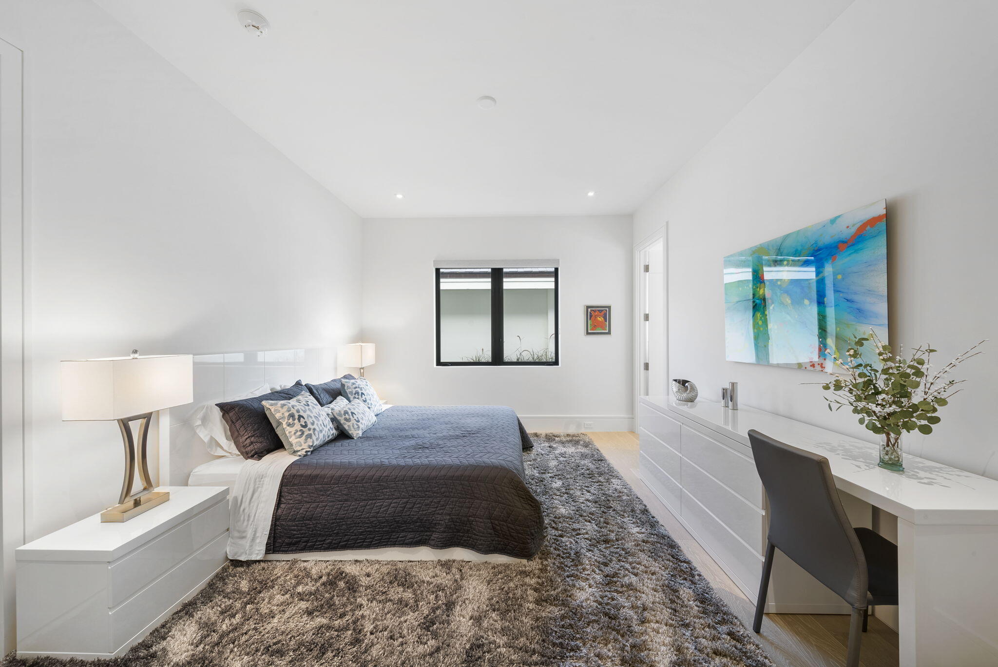 208 Locha Drive Jupiter, FL 33458 - Photo 48 of 125 a living room with a bed furniture and a window