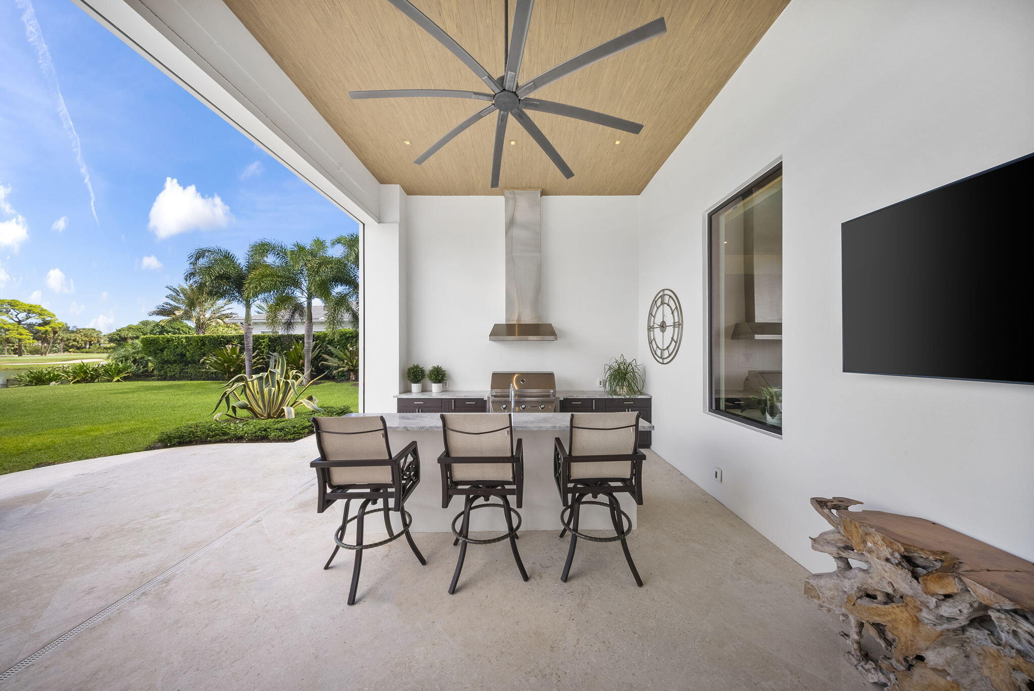 208 Locha Drive Jupiter, FL 33458 - Photo 62 of 125 a view of a dining room with furniture window and outside view