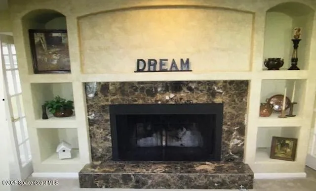 a living room with a fireplace