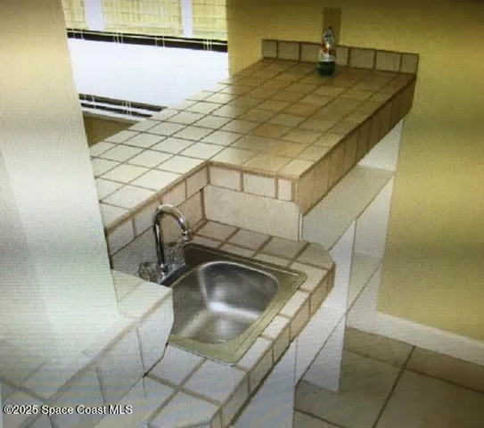 a utility room with a sink