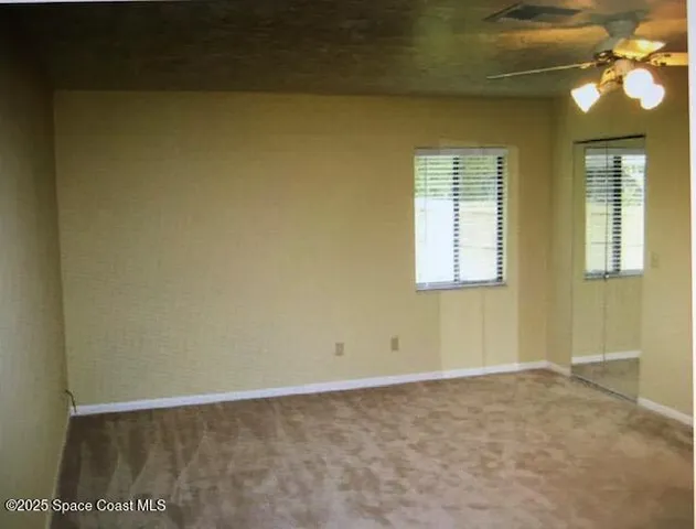 a view of an empty room with window