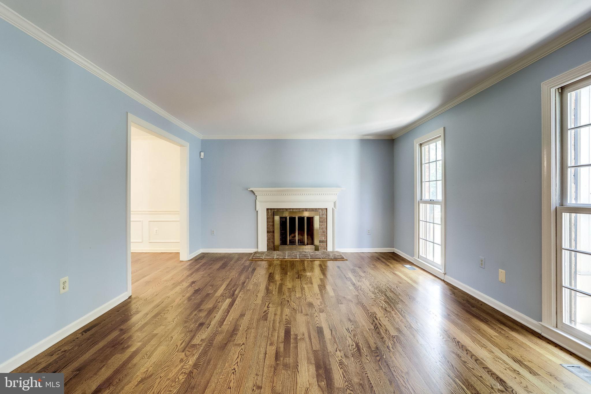 1009 Riva Ridge Drive Great Falls, VA 22066 - Photo 11 of 62 Formal Living Room with Wood Burning Fireplace