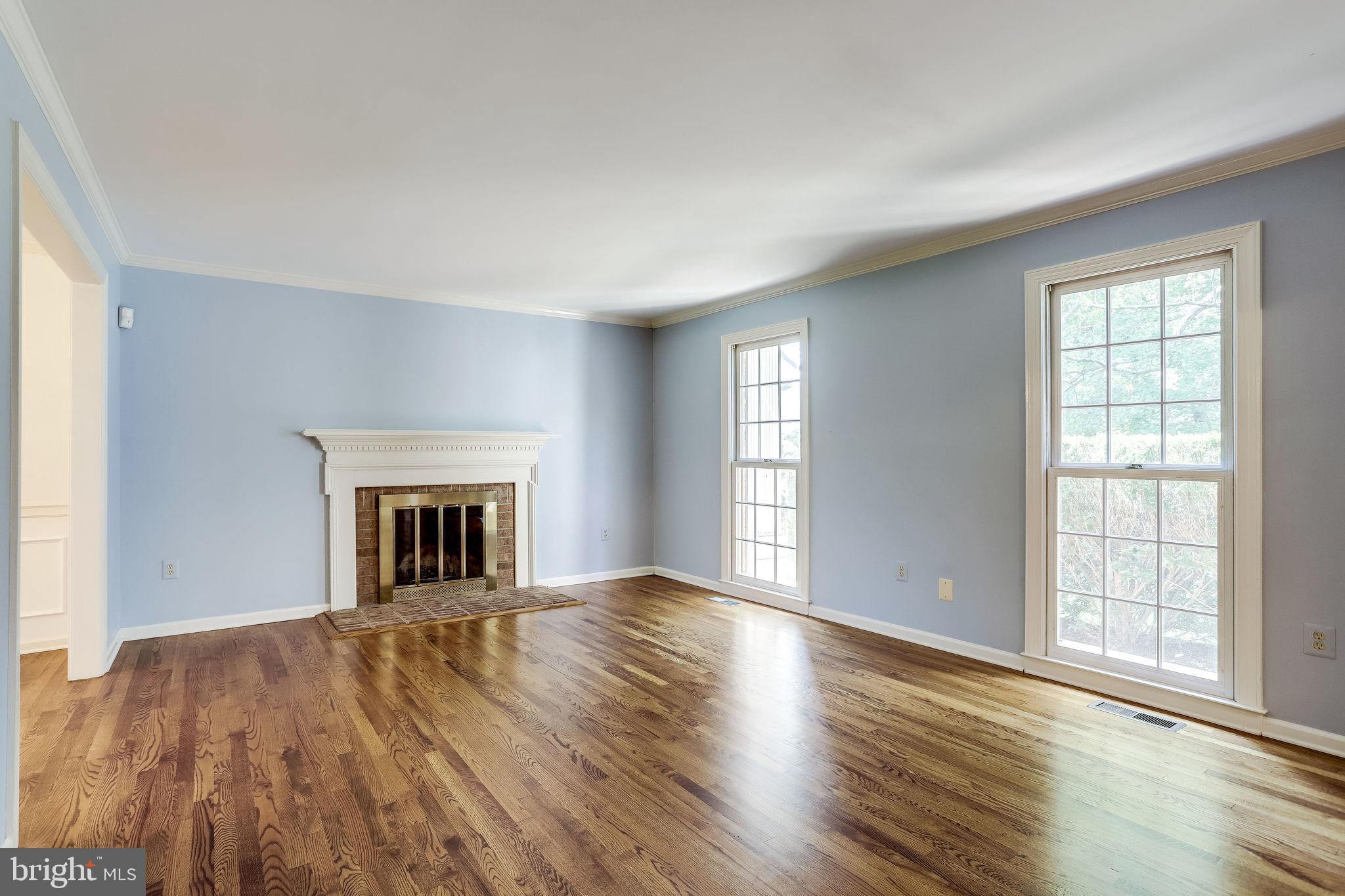 1009 Riva Ridge Drive Great Falls, VA 22066 - Photo 13 of 62 Formal Living Room with Crown Molding