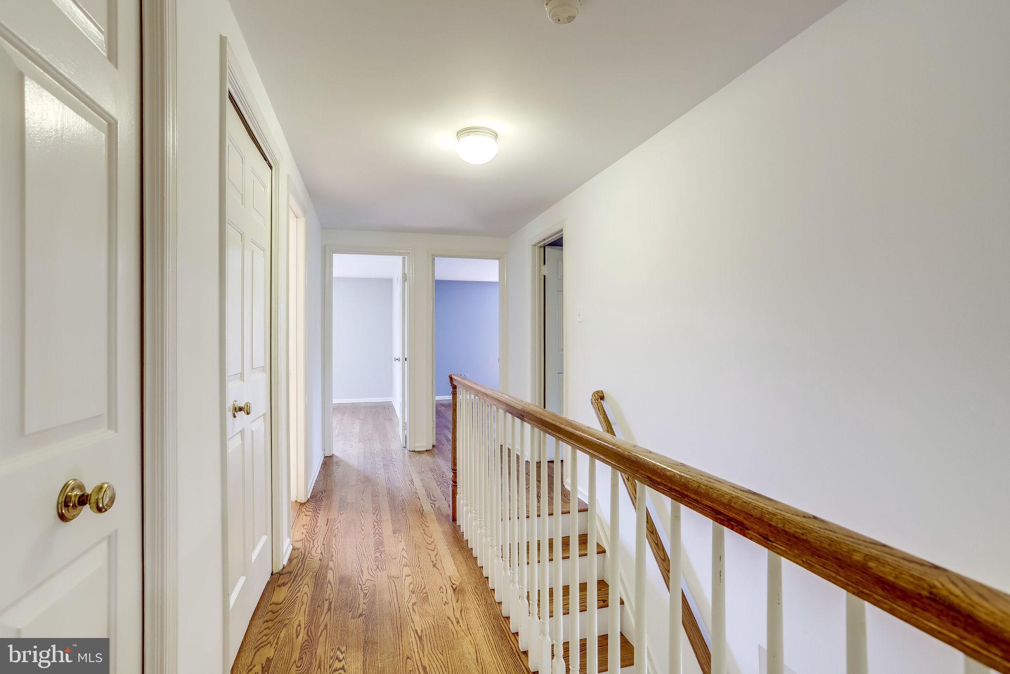 1009 Riva Ridge Drive Great Falls, VA 22066 - Photo 30 of 62 Upper Level Hall with 2 Linen Closets!