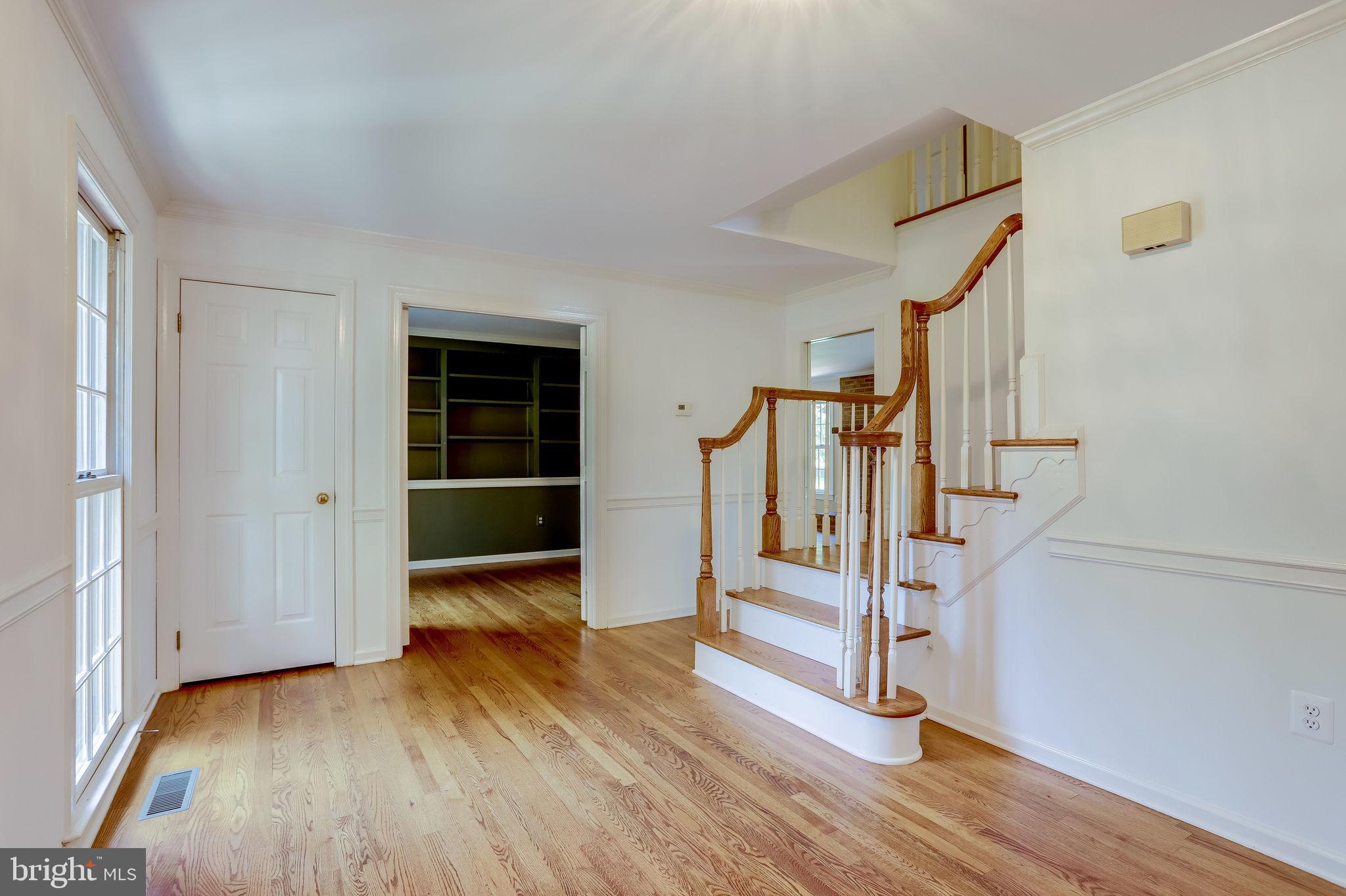 1009 Riva Ridge Drive Great Falls, VA 22066 - Photo 6 of 62 Bright Foyer with Guest Coat Closet