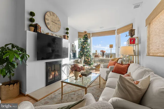 a bedroom with a bed and a fireplace