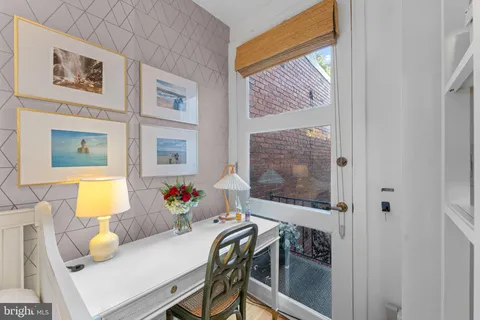 a bathroom with a shower and a sink