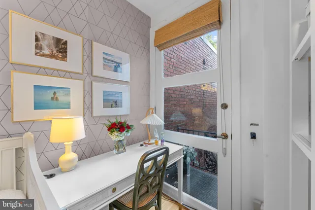 a bathroom with a shower and a sink