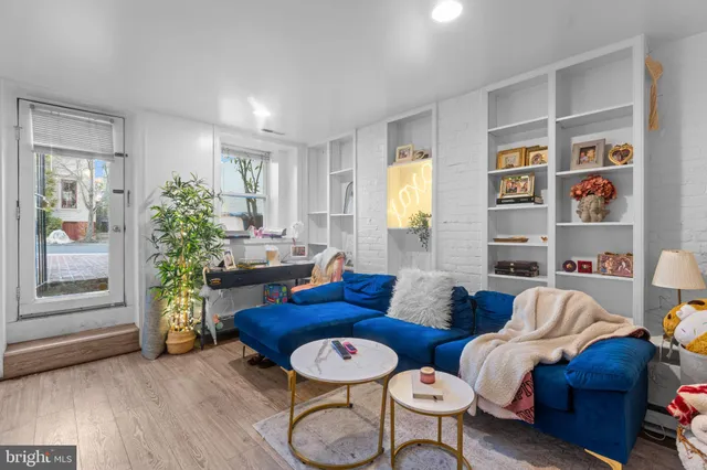 a view of a city with mountains in the background