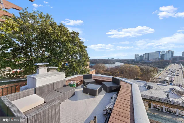 a view of a balcony with city view