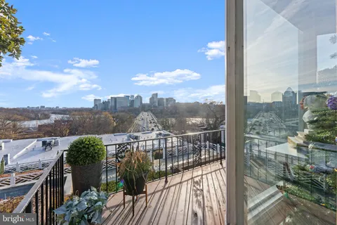 a view of a building with a yard