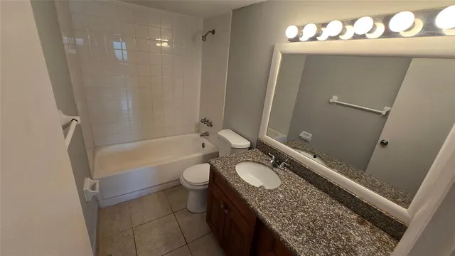 a utility room with faucet washer and dryer