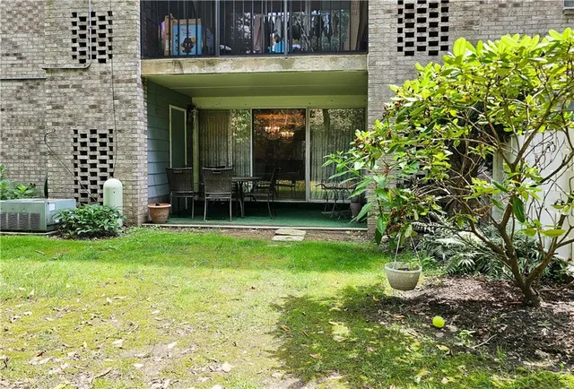 a view of a garden with an outdoor space