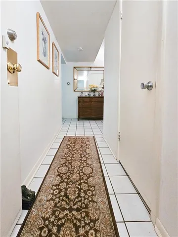 a view of a cars park in front of a building