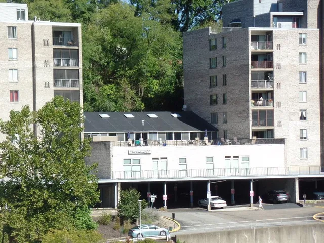 a view of a kitchen with sink and washing machine
