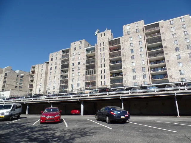 a view of a livingroom with furniture and chandelier