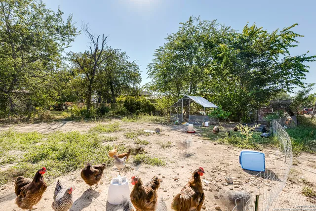 an aerial view of house with outdoor space