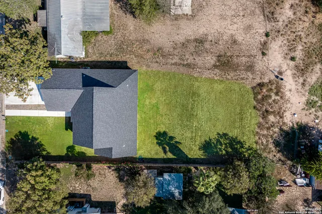 an aerial view of a city with lots of residential buildings