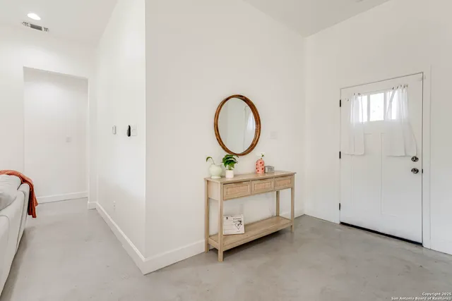 a view of room with washer and dryer