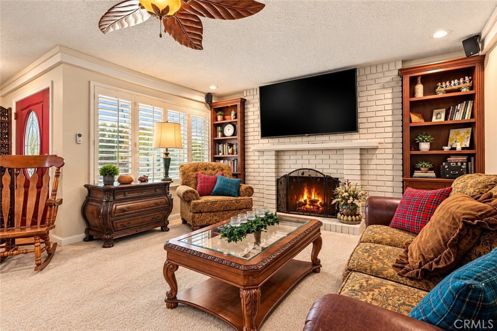 8554 Hillside Road Rancho Cucamonga, CA 91701 - Photo 6 of 40 Living Room and built-ins and gas fireplace