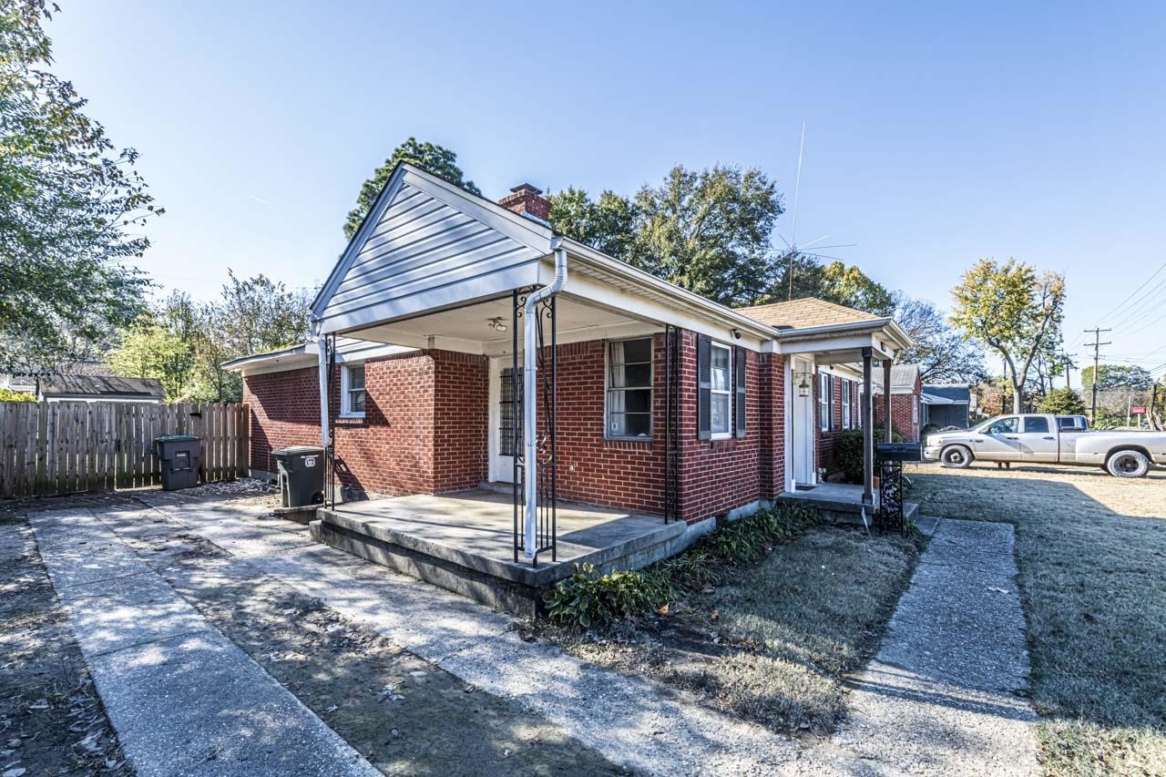 4329 Macon Road Memphis, TN 38122 - Photo 3 of 25 a view of a house with backyard and sitting area
