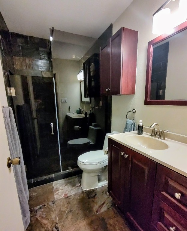 Undisclosed Address Austin, TX 78704 - Photo 3 of 14 a bathroom with a sink toilet and shower