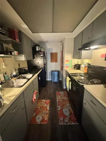 a kitchen with granite countertop lots of counter top space