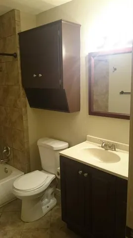 a bathroom with a sink and a toilet