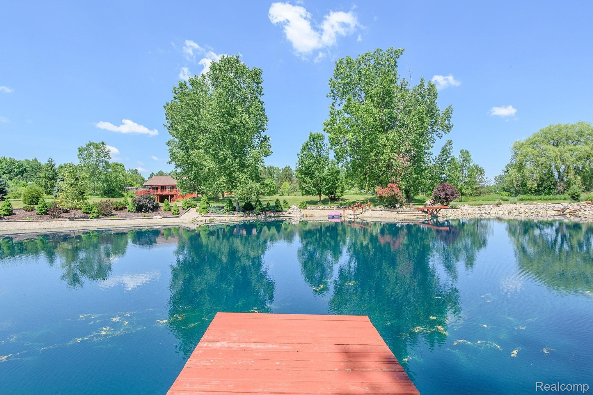 9941 Godfrey Road Bancroft, MI 48414 - Photo 29 of 64 fish the day away on this stocked pond.