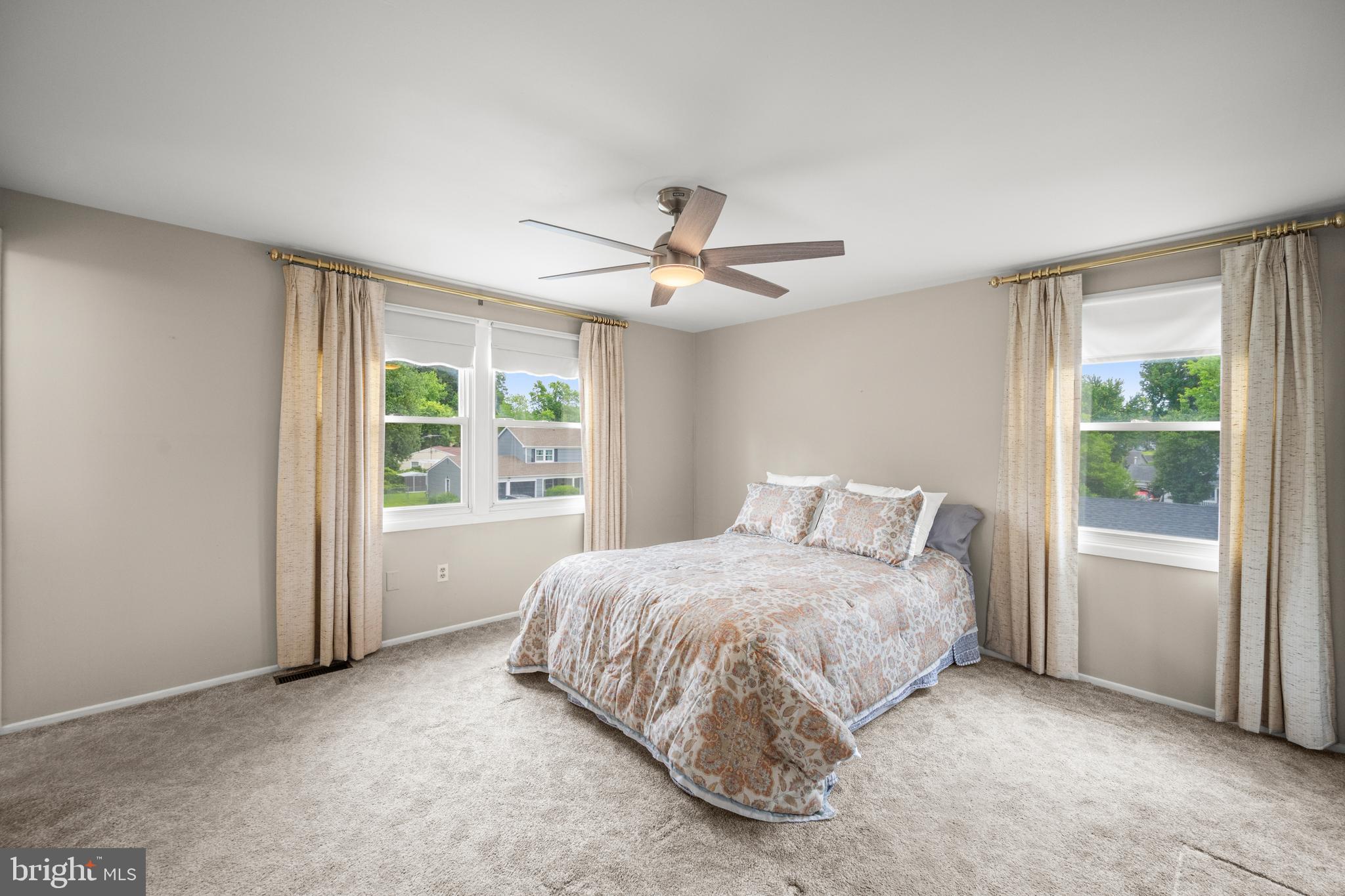 3402 Morlock Lane Bowie, MD 20715 - Photo 11 of 21 a bedroom with a bed and window
