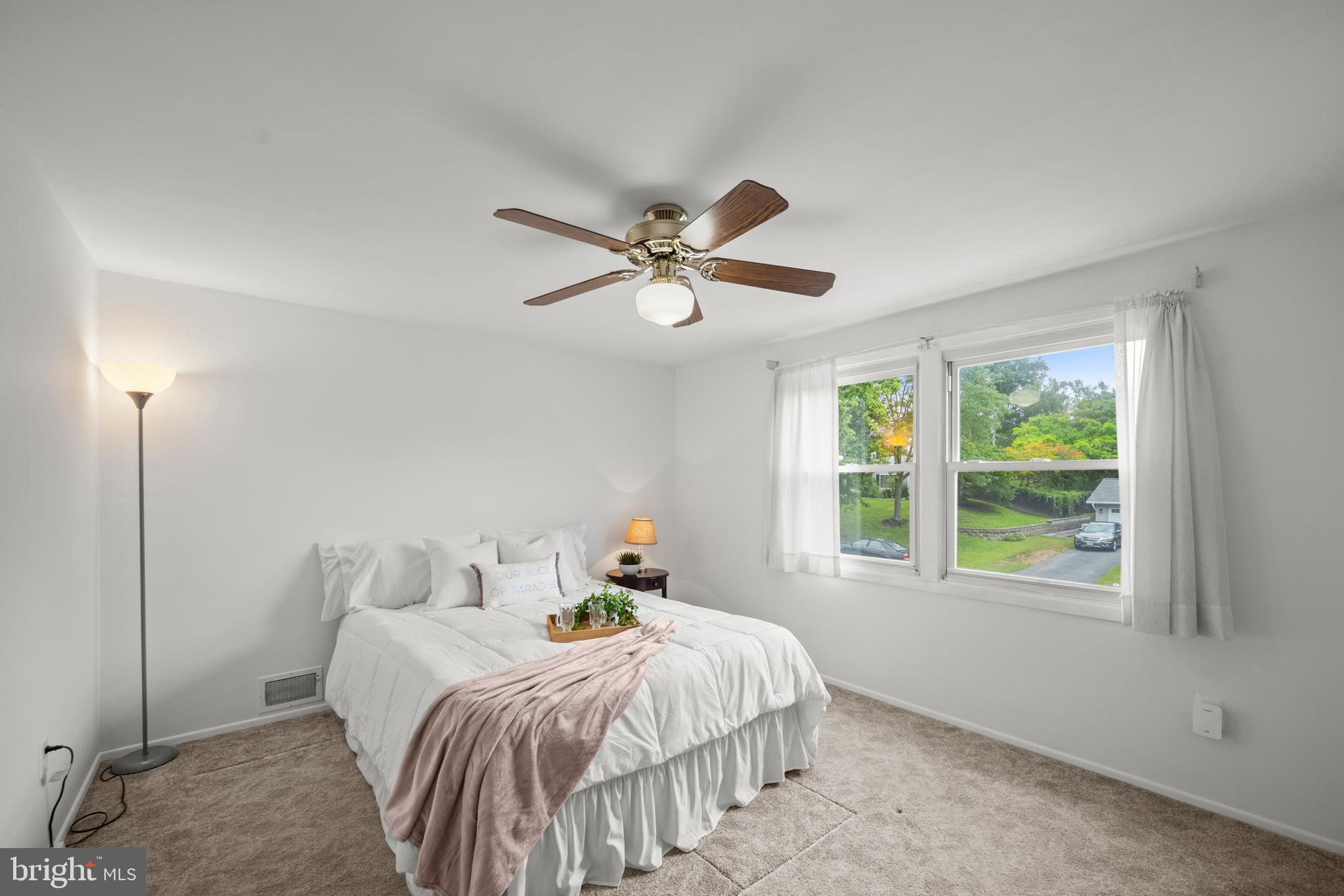 3402 Morlock Lane Bowie, MD 20715 - Photo 14 of 21 a bedroom with a bed and window
