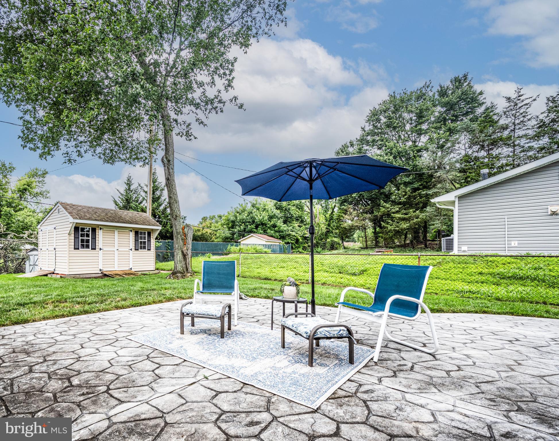 3402 Morlock Lane Bowie, MD 20715 - Photo 18 of 21 a view of backyard with seating space