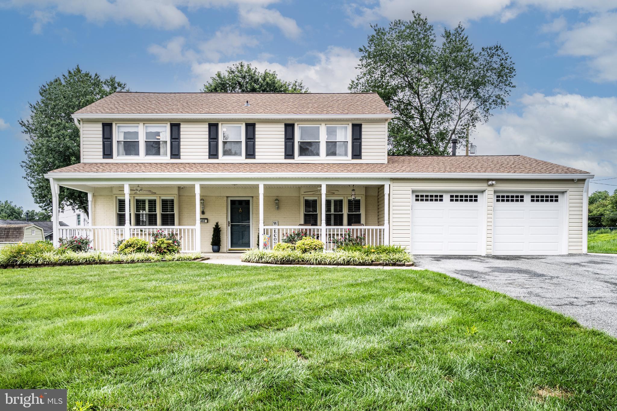 3402 Morlock Lane Bowie, MD 20715 - Photo 2 of 21 front view of a house with a garden