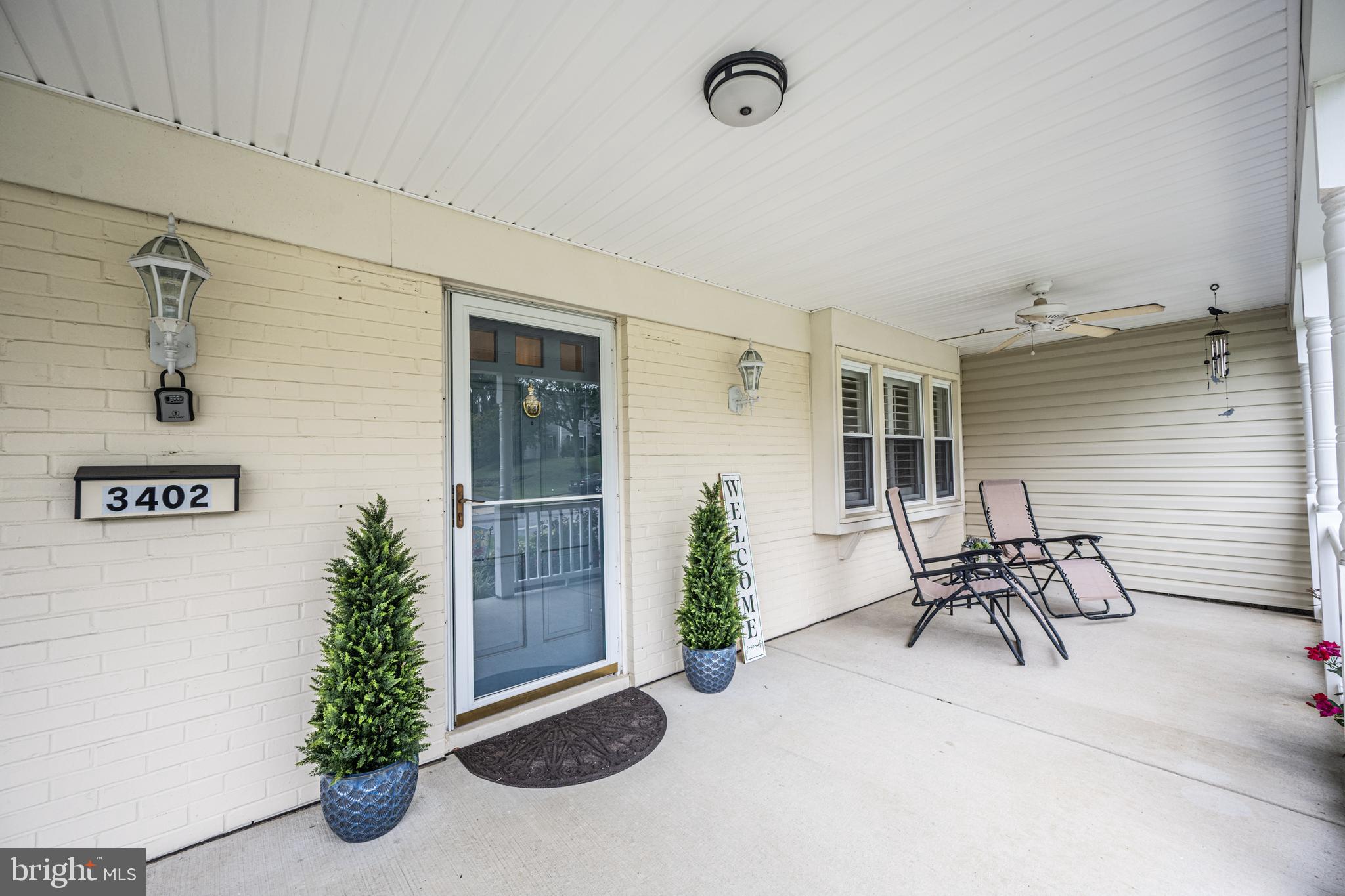 3402 Morlock Lane Bowie, MD 20715 - Photo 3 of 21 a view of patio with a table and chairs