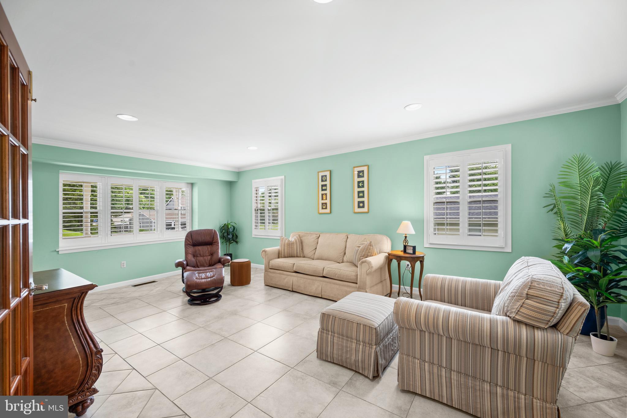 3402 Morlock Lane Bowie, MD 20715 - Photo 6 of 21 a living room with furniture window and potted plant