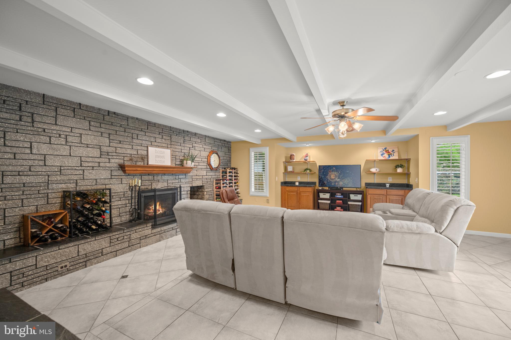3402 Morlock Lane Bowie, MD 20715 - Photo 8 of 21 a living room with furniture and a chandelier