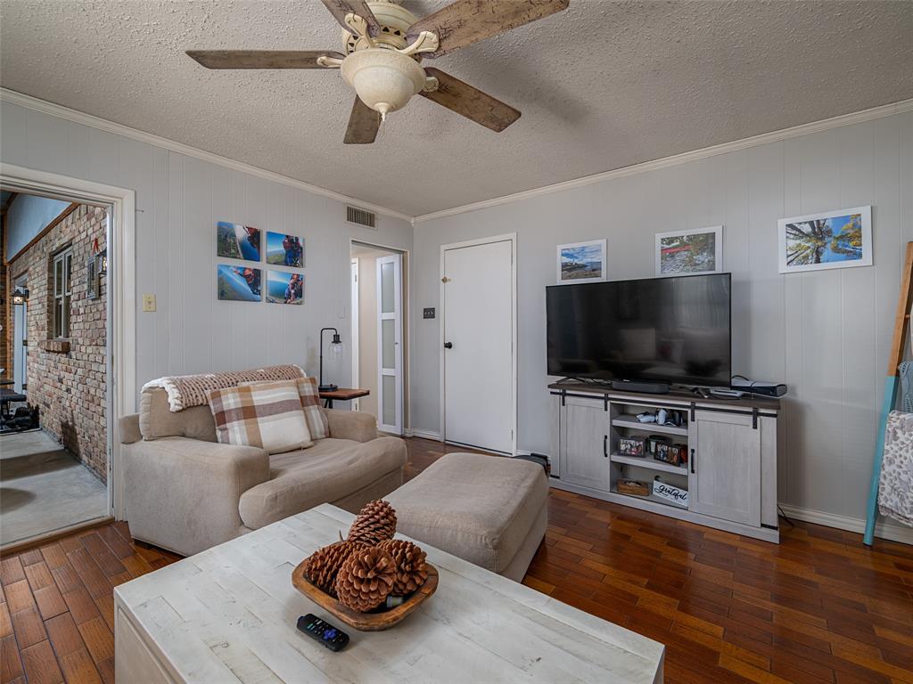 808 Walters Frankston, TX 75763 - Photo 13 of 32 a living room with furniture and a flat screen tv