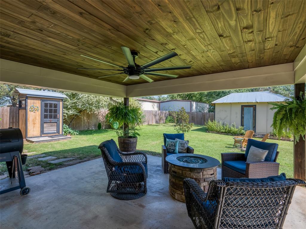 808 Walters Frankston, TX 75763 - Photo 24 of 32 a view of a patio with couches chairs and a table and chairs