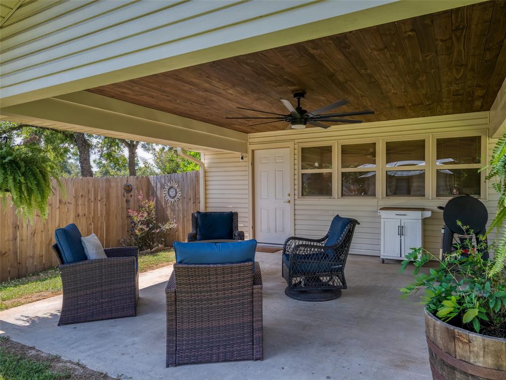 808 Walters Frankston, TX 75763 - Photo 25 of 32 a view of a patio with a table and chairs