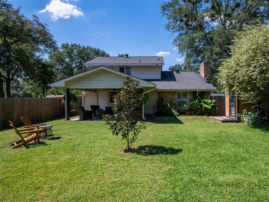 808 Walters Frankston, TX 75763 - Photo 30 of 32 a view of a chair and table under an umbrella