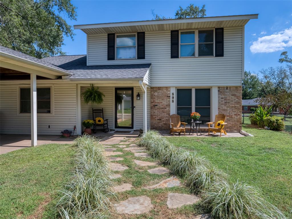 808 Walters Frankston, TX 75763 - Photo 4 of 32 a view of a house with backyard and porch