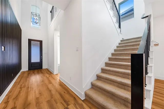 a view of entryway with wooden floor