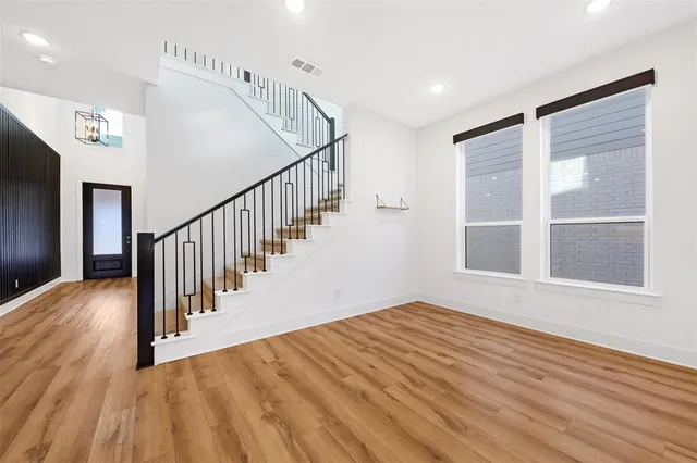 a view of entryway with wooden floor