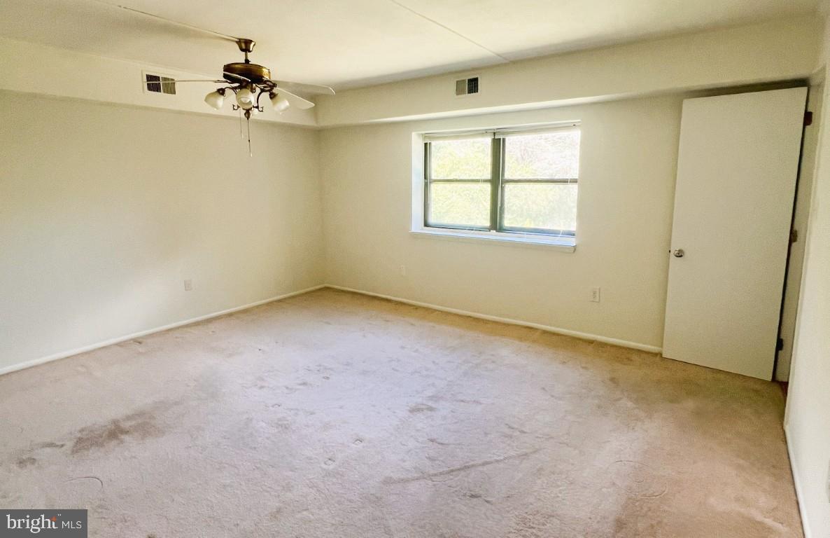 84 Welsh Tract Road, Unit 311 Newark, DE 19713 - Photo 12 of 25 a view of an empty room with a window