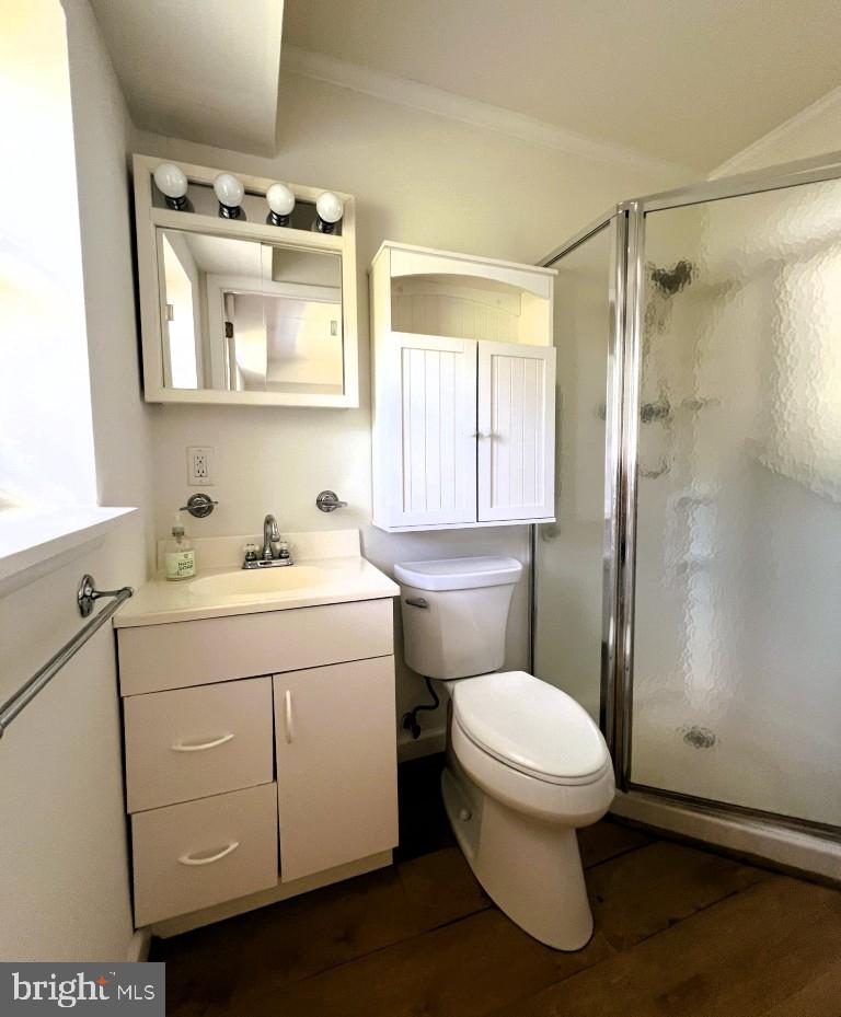 84 Welsh Tract Road, Unit 311 Newark, DE 19713 - Photo 13 of 25 a bathroom with a sink toilet and shower